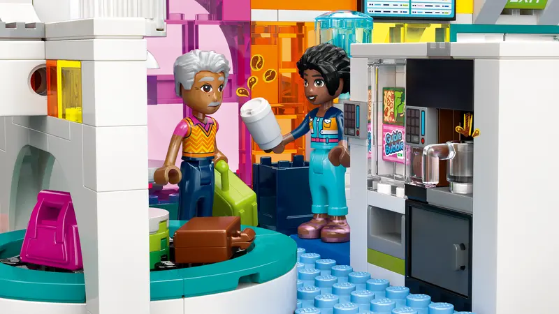 LEGO® Friends 42656 Heartlake City Airport and Airplane includes a vending machine and water cooler