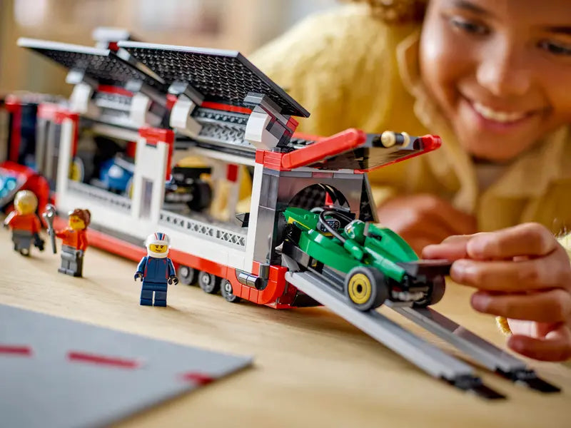 LEGO City F1 Truck with RB20 & AMR24 F1 Cars 60445 features a double vehicle bay with fully opening side panels