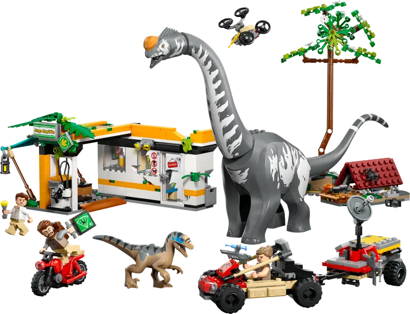 LEGO Jurassic World 76973 features 2 dinosaurs, 3 minifigures, Camp area with falling tree, Charging station and vehicles