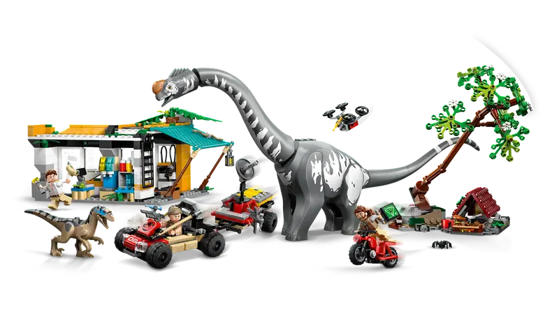 LEGO Jurassic World 76973 features 2 dinosaurs, 3 minifigures, Camp area with falling tree, Charging station and vehicles