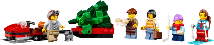 LEGO® ICONS Alpine Lodge 10325 features snowmobile and trailer, plus a Christmas tree, 5 minifigures and cat, squirrel and bird figures