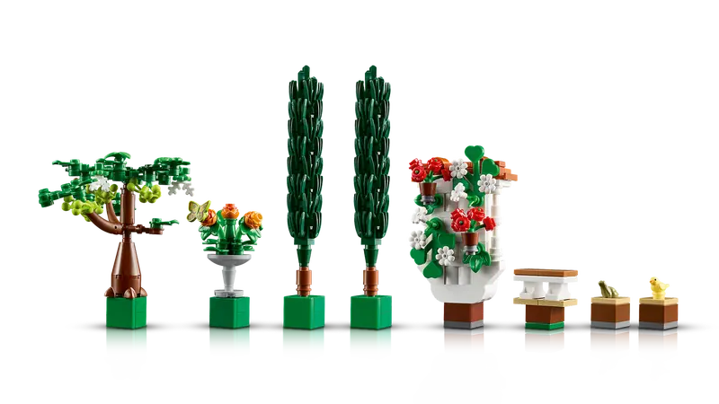 LEGO® Icons Fountain Garden 10359 features a lavabo, 2 cypress trees, flowering grapevines, 4 pergolas and tiled pathways, plus luna moth, bird and frog figures