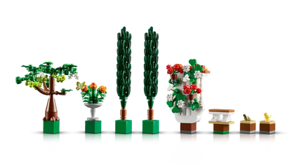 LEGO® Icons Fountain Garden 10359 features a lavabo, 2 cypress trees, flowering grapevines, 4 pergolas and tiled pathways, plus luna moth, bird and frog figures