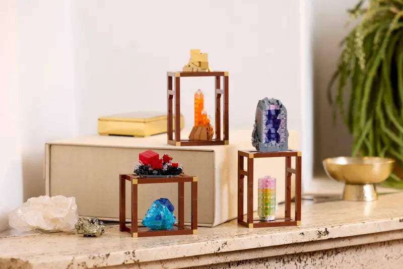 LEGO Ideas 21362 Mineral Collection displayed on a shelf with decorative items