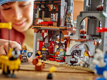 A kid playing with LEGO® Creator 3in1 Medieval Horse Knight Castle 31168