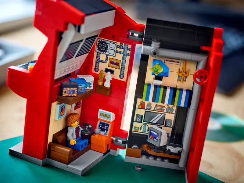 LEGO 40805 Arcade Machine opens up  to reveal a detailed gamer’s room inside with a minifigure 