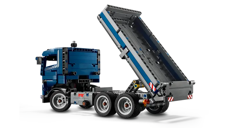 LEGO® Technic Tipping Dump Truck 42203 Turn the knob on the side of the truck to tip the lid.