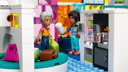  LEGO® Friends 42656 Heartlake City Airport and Airplane includes a vending machine and water cooler