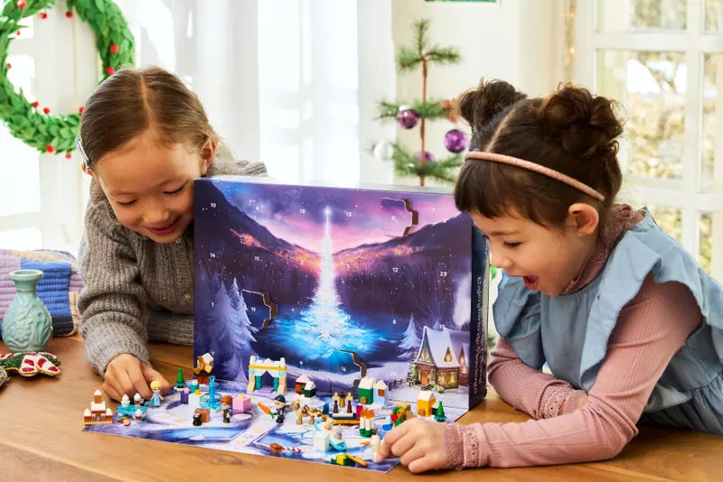Kids playing with LEGO® Disney 43273 Frozen Advent Calendar 2025