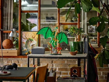 LEGO® NINJAGO® The Guardian Dragon 71847 displayed on a table with other decorative items