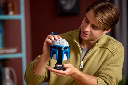 A person holding LEGO® Star Wars™ Jango Fett™ Helmet 75408 