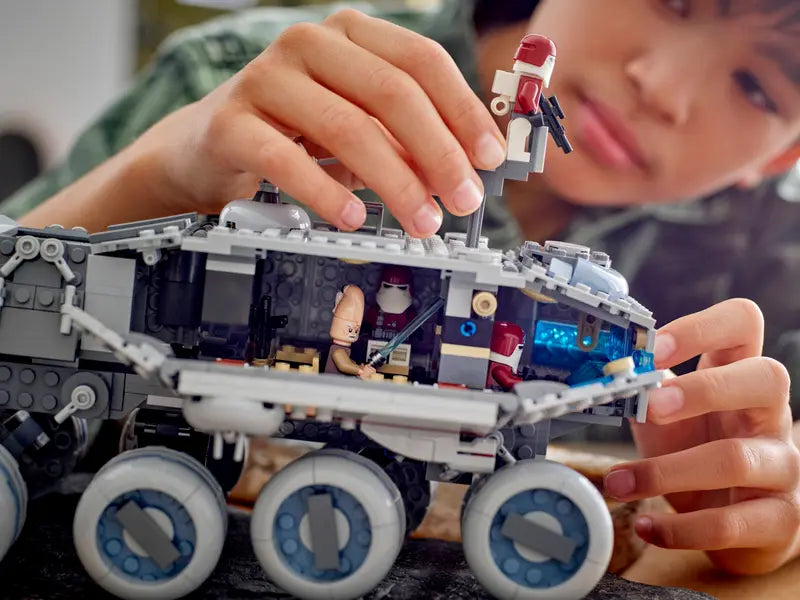 Kid playing with LEGO® Star Wars: Republic Juggernaut 75413 