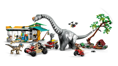 LEGO Jurassic World 76973 features 2 dinosaurs, 3 minifigures, Camp area with falling tree, Charging station and vehicles